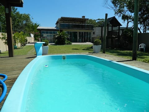 house by the lagoon with boat ramp