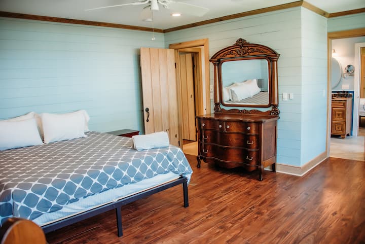 MBR with king bed  facing bayside