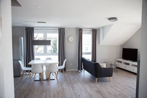Modern new apartment with 35 sqm roof terrace + fireplace