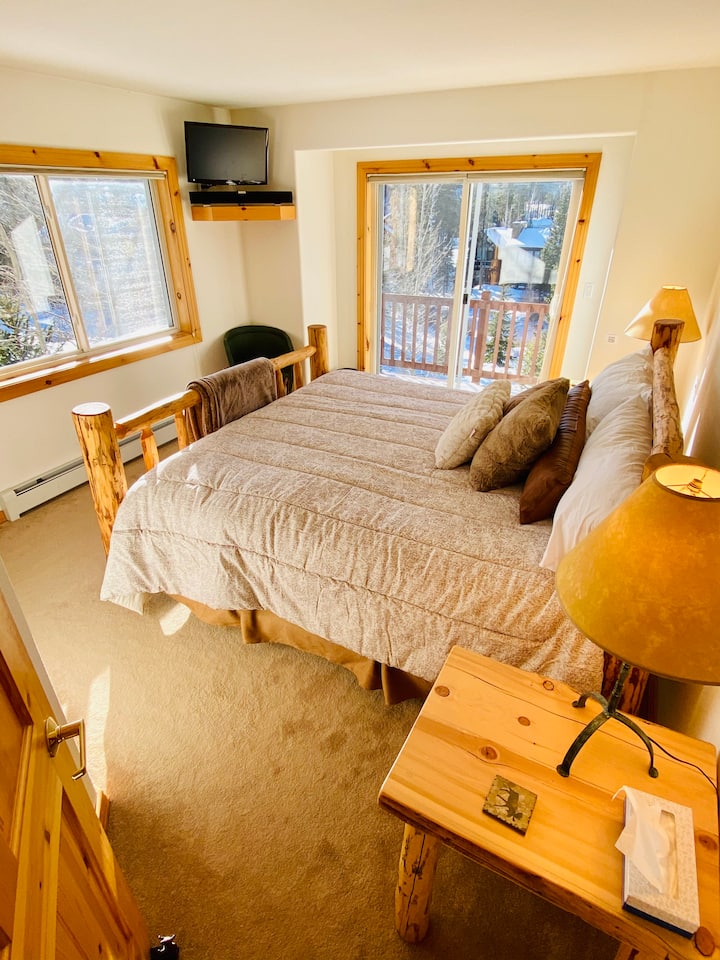 Master  bedroom with king bed and private balcony (third floor)