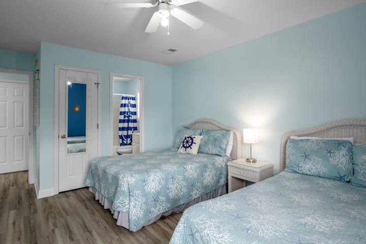 Downstair bedroom (1st) floor, w/ (2) double beds and ensuite