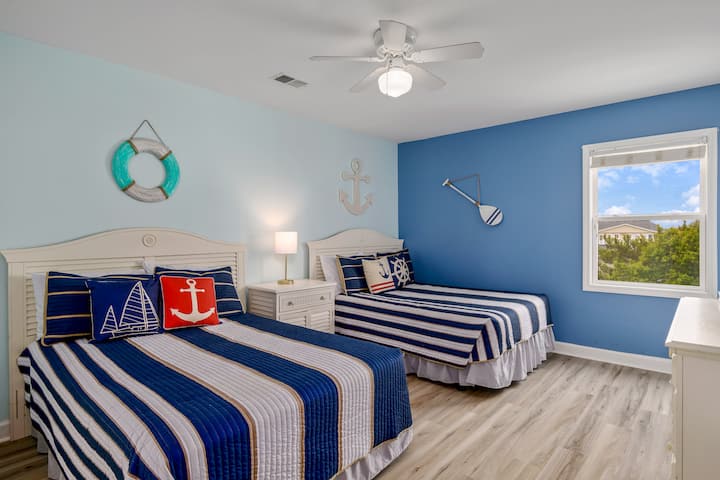 Downstairs bedroom number 3. Two Double beds with en suite bathroom 