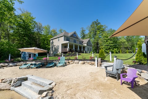 Lakefront Lodge sleeps 18 w. private beach & dock