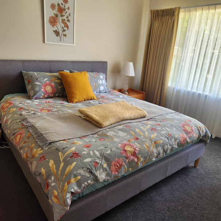 Kind size room with different doona cover to reflect seasons