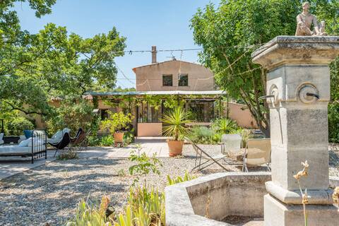 Provençal house on a hill, in the forest.