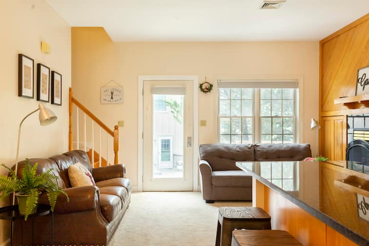 Living and dining room with fireplace.