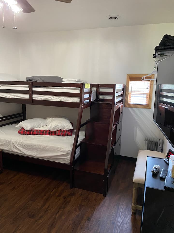Bedroom #2 has 2 full size beds and 2 twin beds (sleeps 6) has smart TV with DirecTV and dressing table with lighted mirror...