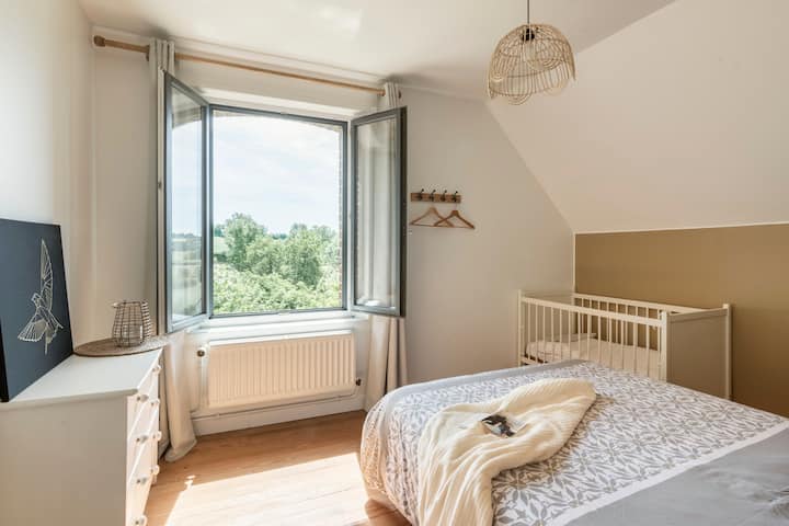 Bedroom 3 "Le cocoon" on the 1st floor with double bed and orchard view