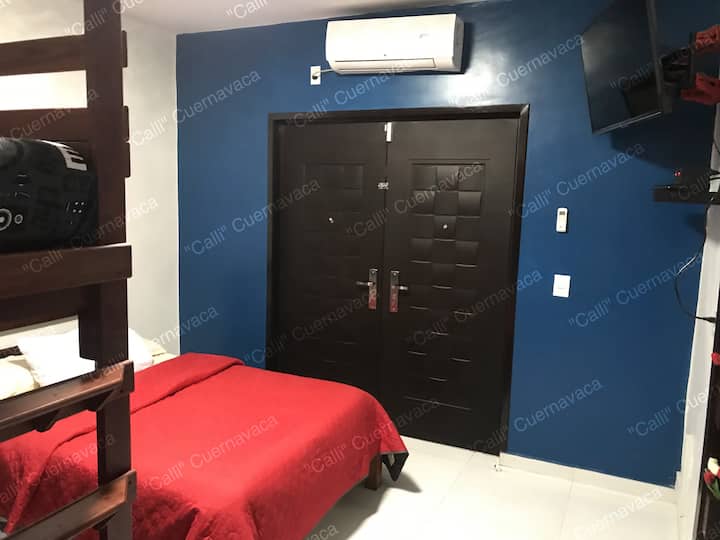 Bedroom 4, also has air conditioning.