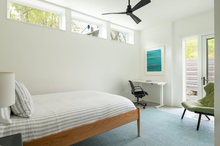 identical bedrooms downstairs, queen beds