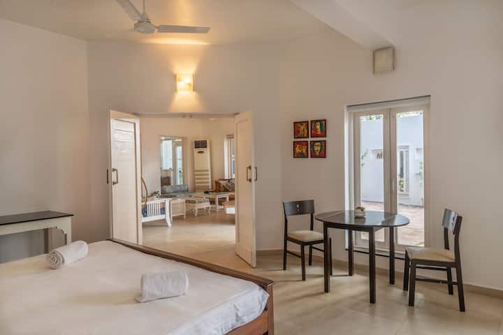 The Bedroom overlooking the picturesque living room.