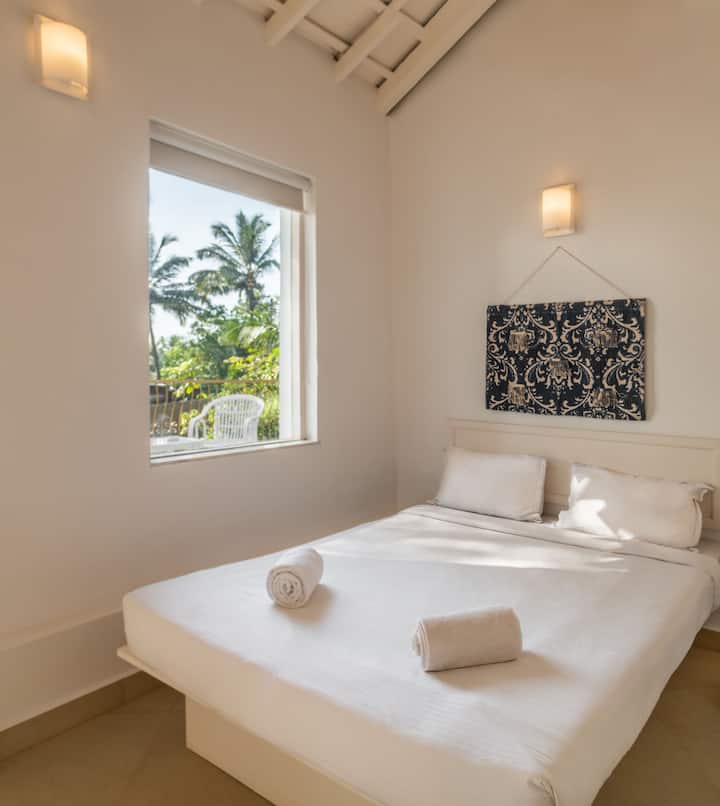 The Bed side Window - Giving you a glimpse of the Morning Sea.