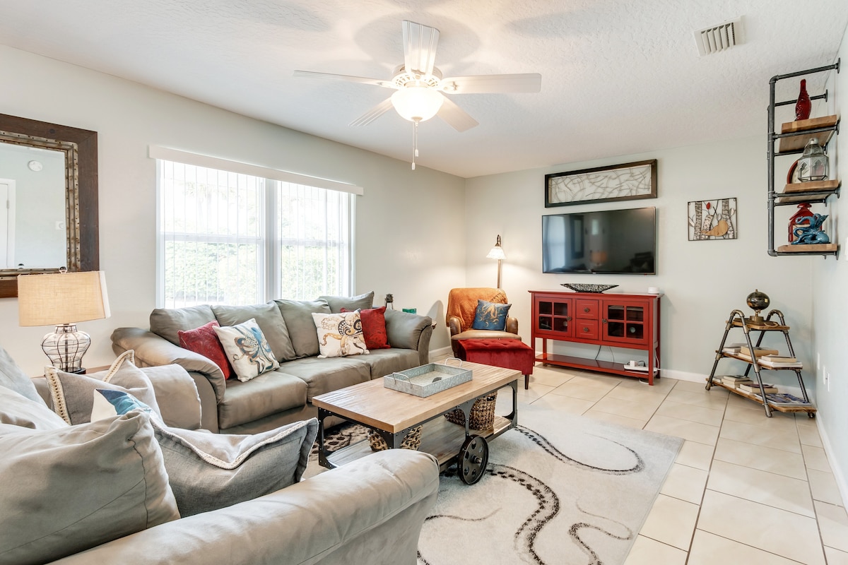 The living room has plenty of comfortable space to relax.