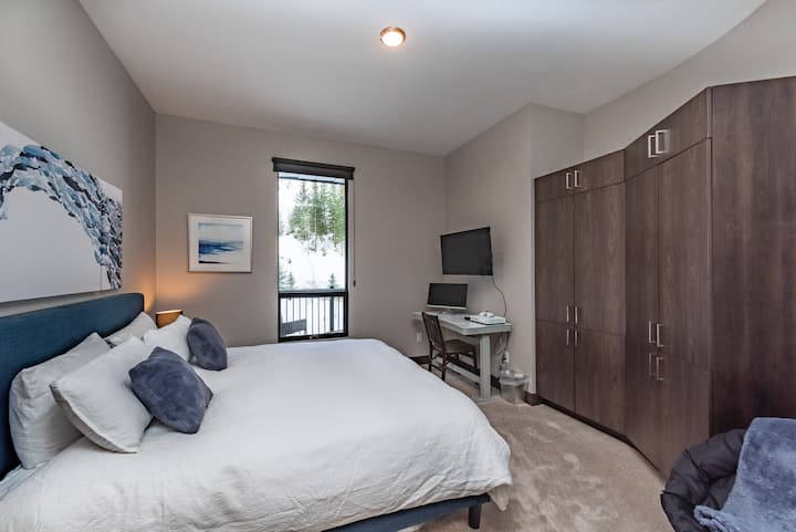 2nd Bedroom featuring a King Bed, Adjustable Height Desk, Monitor w/ HDMI Cable and Mountain Views