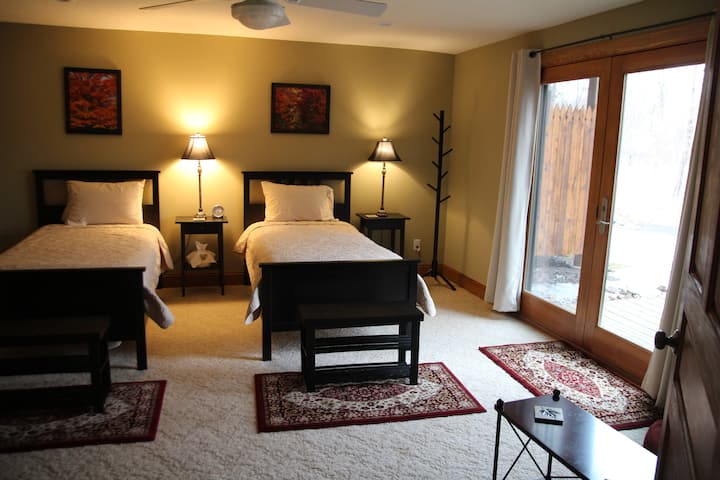 The Sugar Maple Room with twin beds locaed on the Lower, Walk-out level.  It is located next to the TV Room.