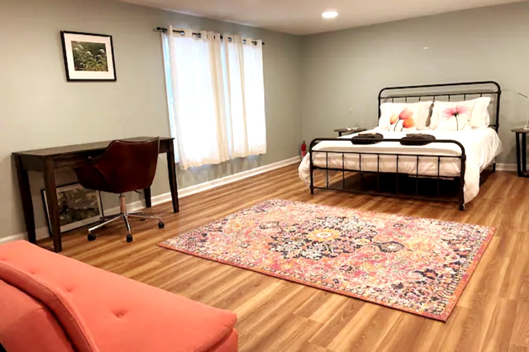 Meadow - Bedroom 4, huge bedroom with queen bed, desk, and futon couch.