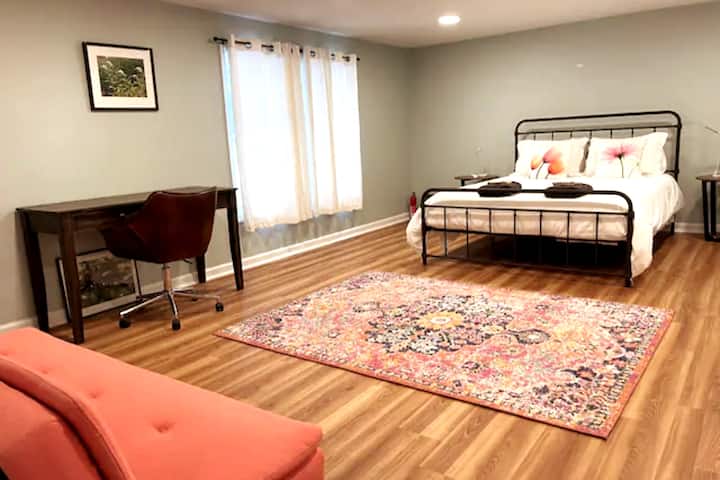 Meadow - Bedroom 4, huge bedroom with queen bed, desk, and futon couch.