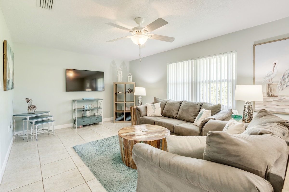 The living room has plenty of comfortable space to relax.