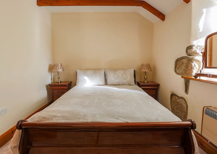 room 3 with French style king size sleigh bed and  views over the surrounding countryside