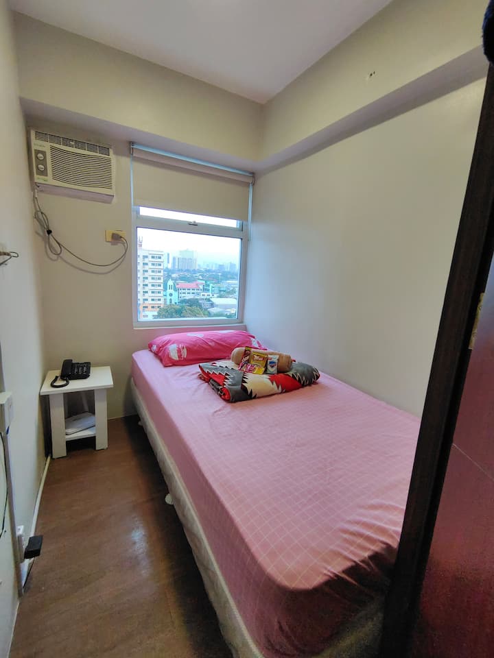 Bedroom 2 with  single size bed and (PLDT fiber WiFi and landline)