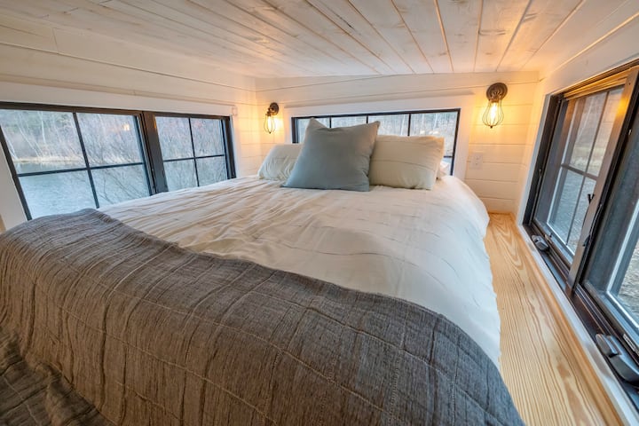 Guest loft with Queen size bed and 180 degrees of water views