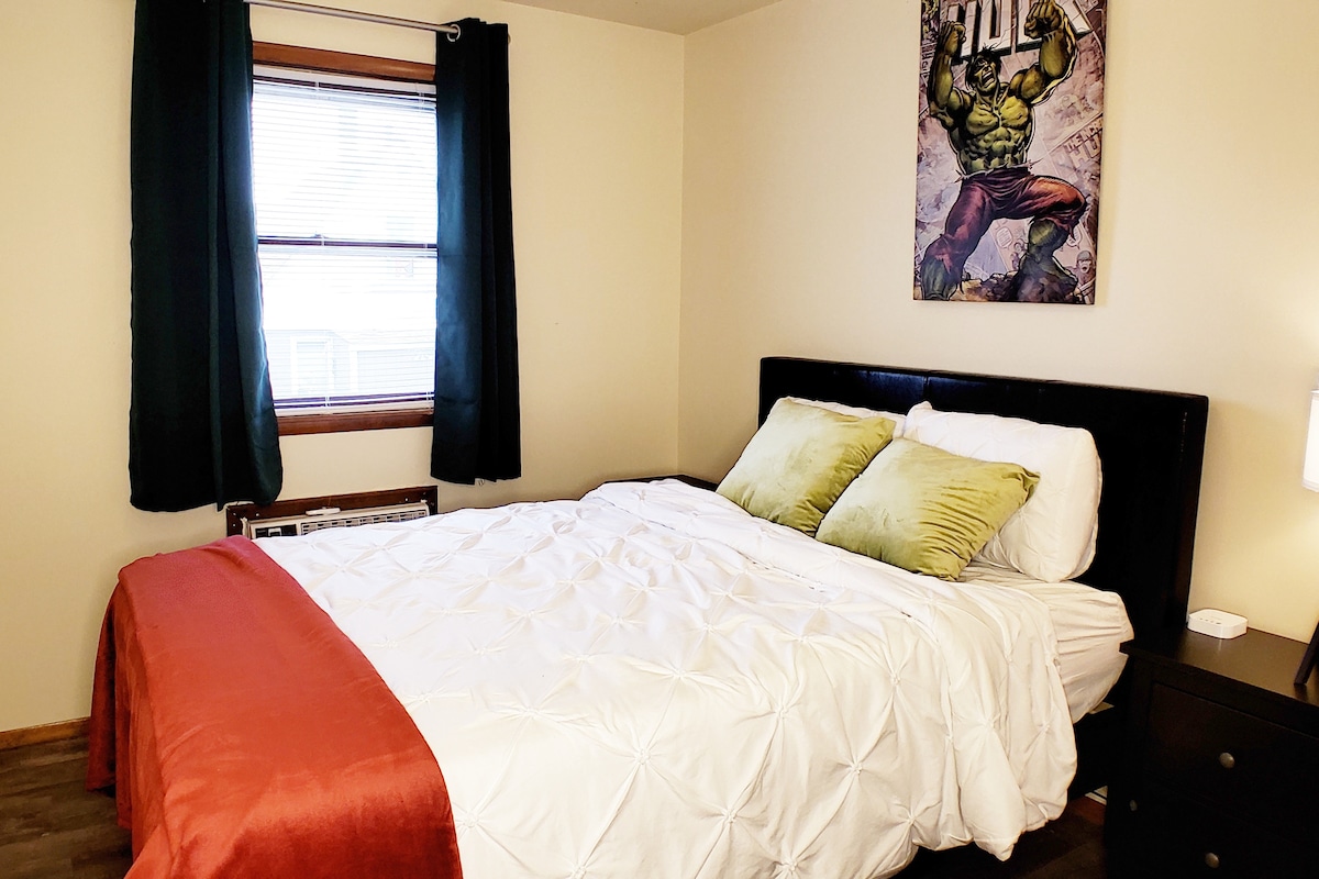 HULK room - 2nd beedroom. Queen size memory foam mattress.  Nightstand with multiport charging station with 3 plugs, 3 USB and 1 USB-C.