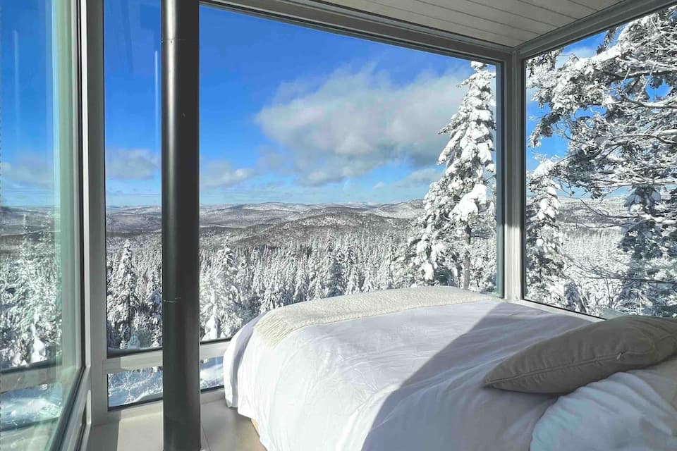 A glass tiny house on a mountaintop near Quebec City, Lac-Beauport, Quebec, Canada, photo 5 of 10