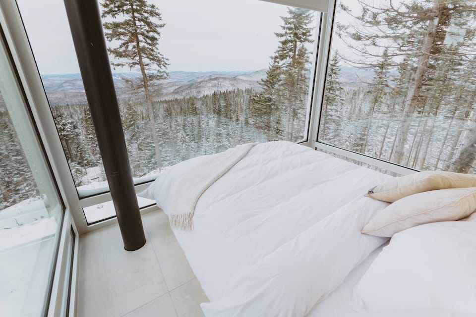 A glass tiny house on a mountaintop near Quebec City, Lac-Beauport, Quebec, Canada, photo 9 of 10