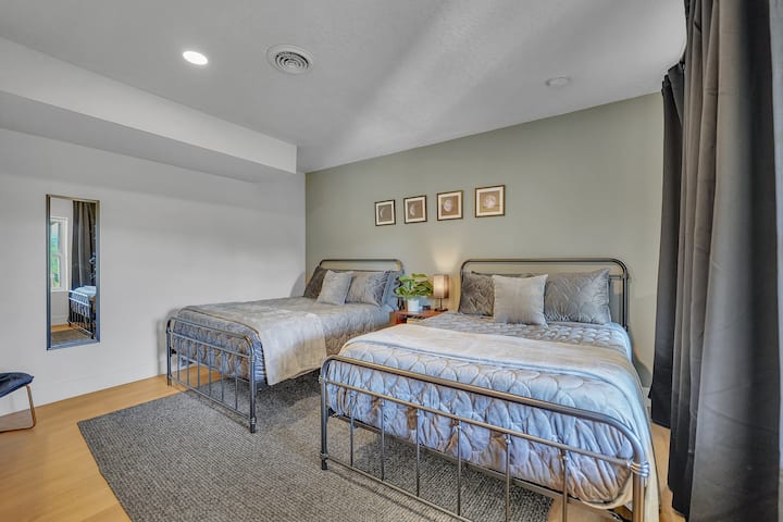 4th downstairs bedroom with two queen medium memory foam mattresses. 