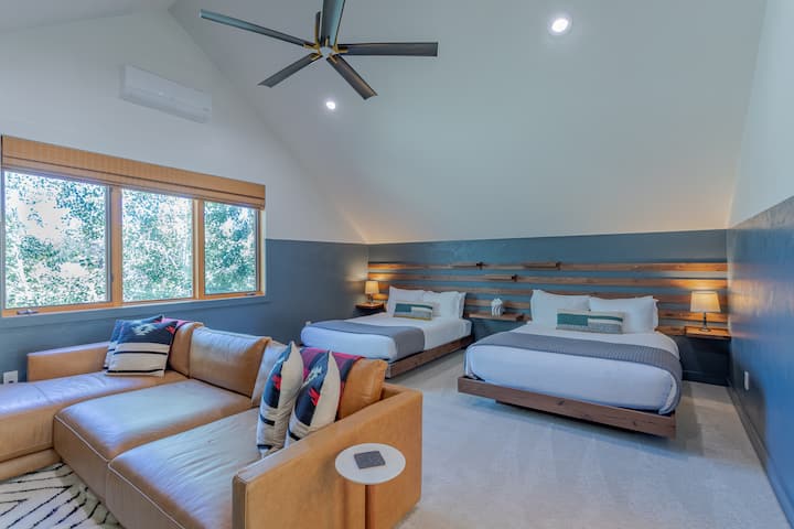 3rd Floor - Loft Suite - Deep leather couch to cuddle up for a movie or a perfect place to take a nap.