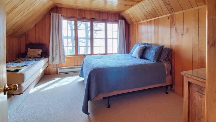 Bedroom 1: A queen bed overlooking the lake - great place to catch the sunrise.