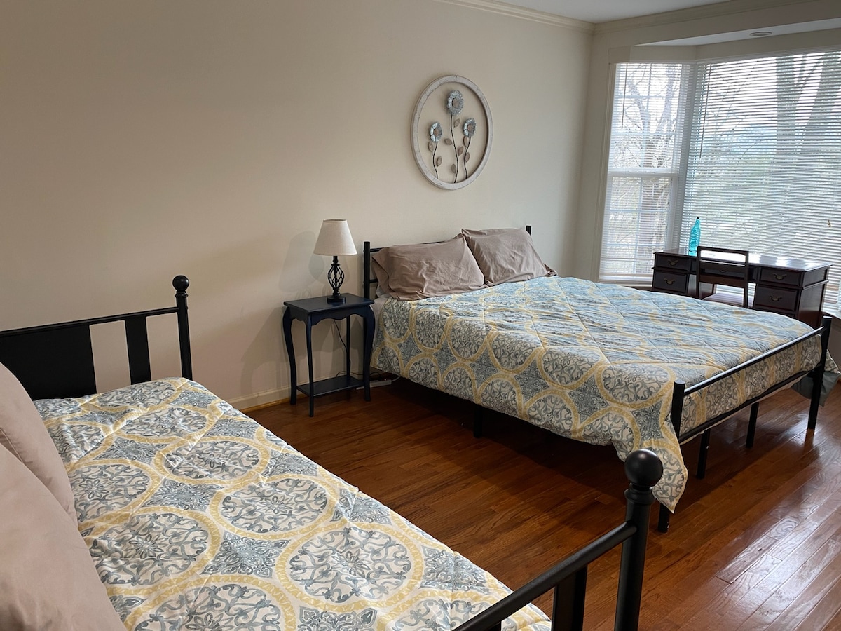 Master suite on the main level.   Has a queen bed, a trundle of twins, room for our pack and play, a gorgeous view and contains Bathroom 1.