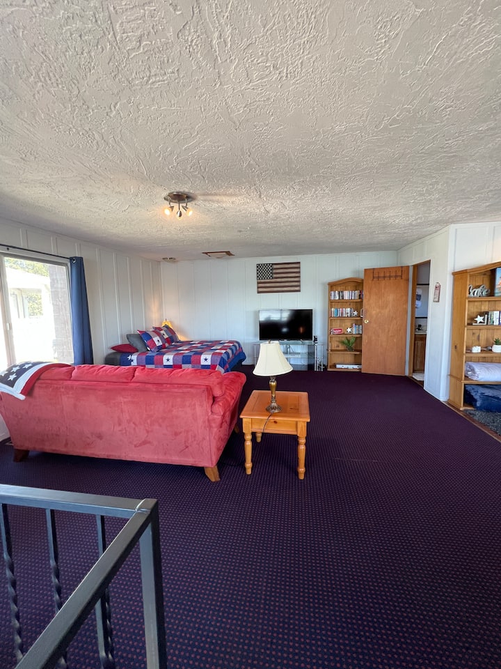 Upstairs Queen with full bathroom. One Double and 2 twin beds. Also has to make up, get ready sinks.