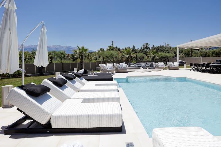 Villa with spa – playroom, 100m from sandy beach