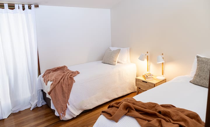 Bedroom 3 - two king singles with private balcony. Can be made into 1 king bed