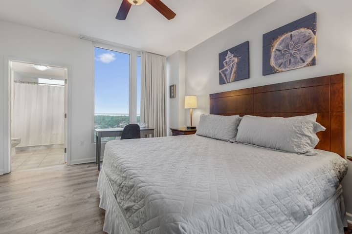 Sleep like a King in the spacious master bedroom with en-suite..  Patio Access.  Gorgeous views