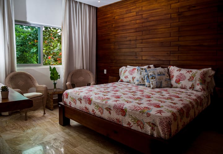 Our apartment in Las Terrenas features an artistic master bedroom, where green materials have been summoned to create a unique living environment not found in any other apartment in the city. Come see and experience it, you will like to stay longer.