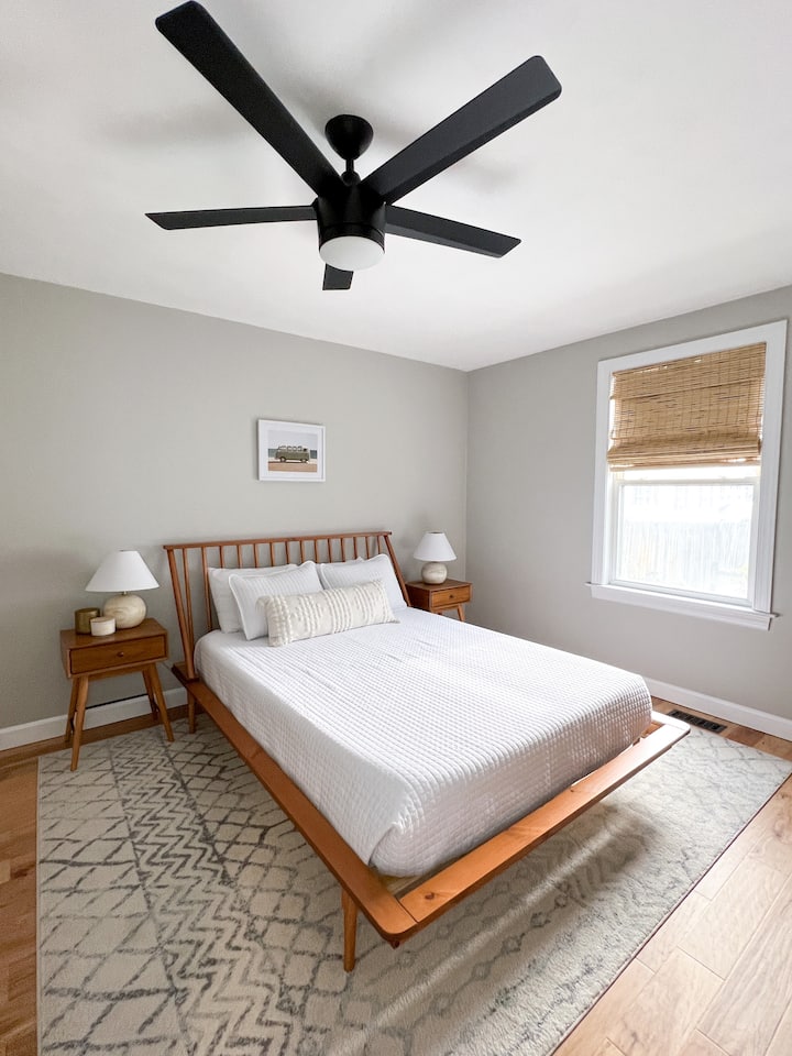 Downstairs bedroom with one queen bed