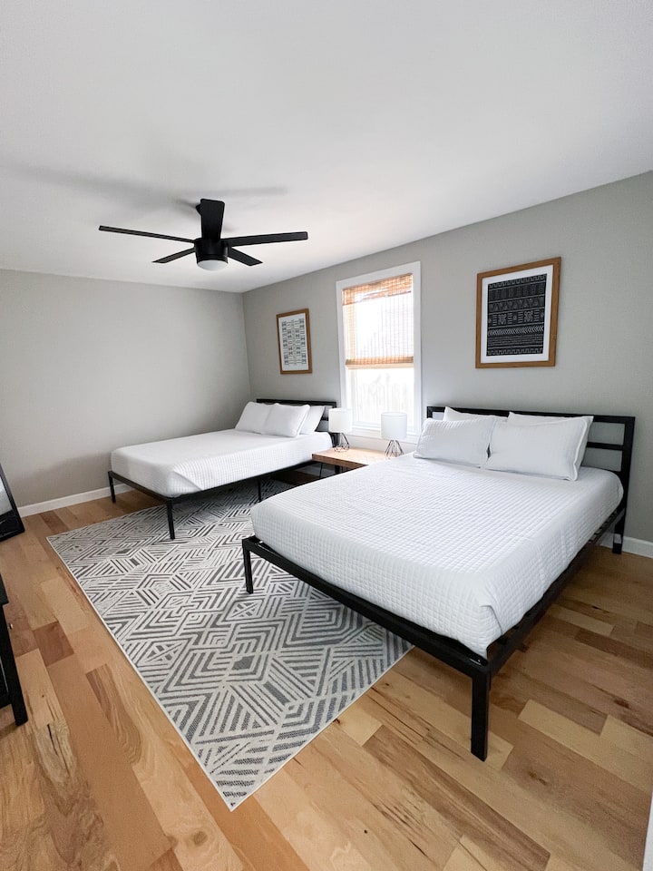Downstairs bedroom with two queen beds