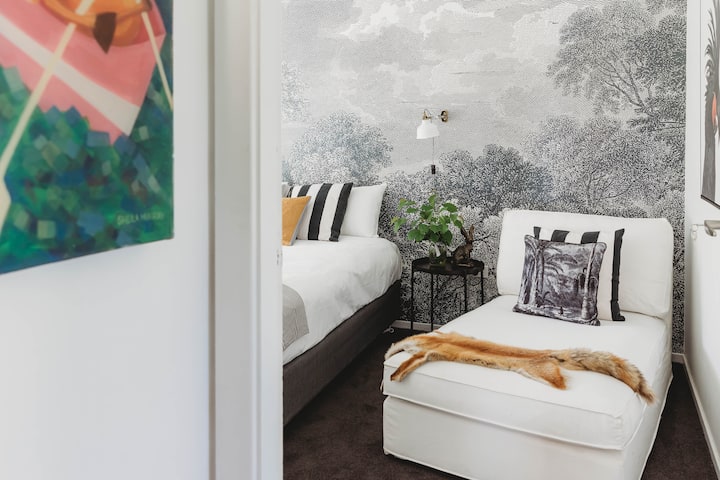 The large master bedroom also has a daybed if you need to escape for an afternoon snooze 