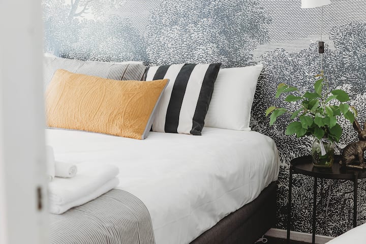 King sized bed with Sealy Australian made plush pillow top mattress. Electric blankets to keep you warm and pure wool organic Australian made winter weight doona & pillows.