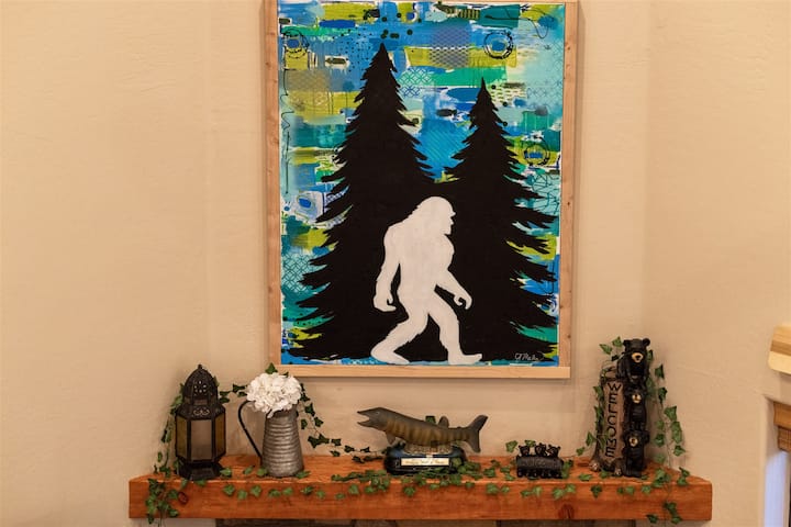 Grumpy Toads Getaway cabin character — Bigfoot art and rustic decor