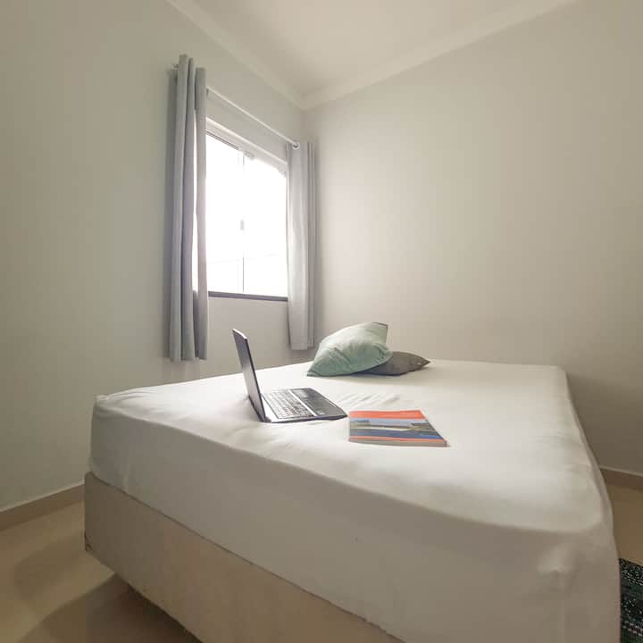 Bedroom 2 with clothes rack, niches, double bed, bunk bed and air conditioning.