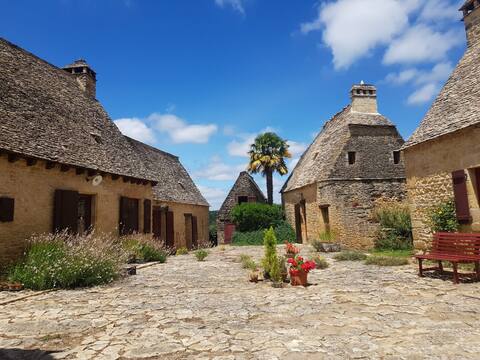 Authentic Perigord hamlet at the roofs of lauzes