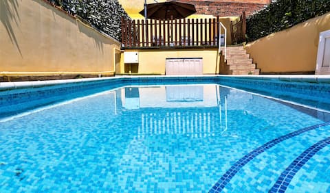 Town center and spacious home near the beach