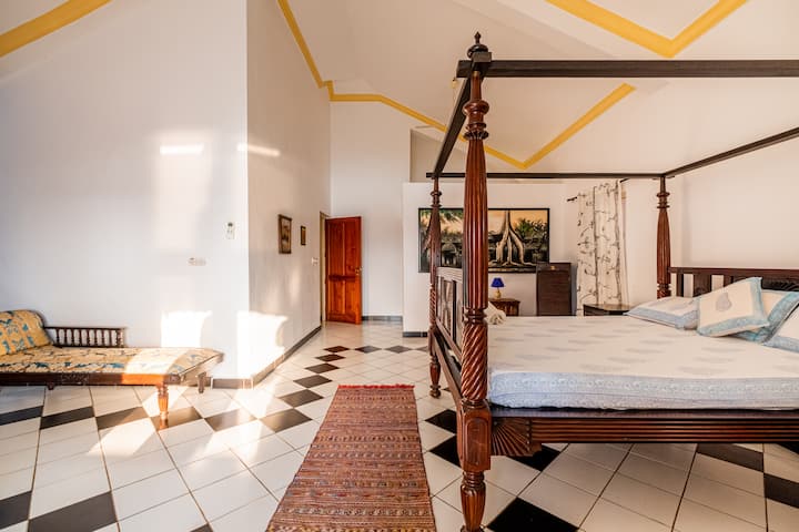 The room showcases a bed that has been carefully chosen from the Royal Households, ensuring the utmost comfort and style. The room is designed to provide a serene and peaceful atmosphere, allowing guests to unwind and relax in utmost comfort.