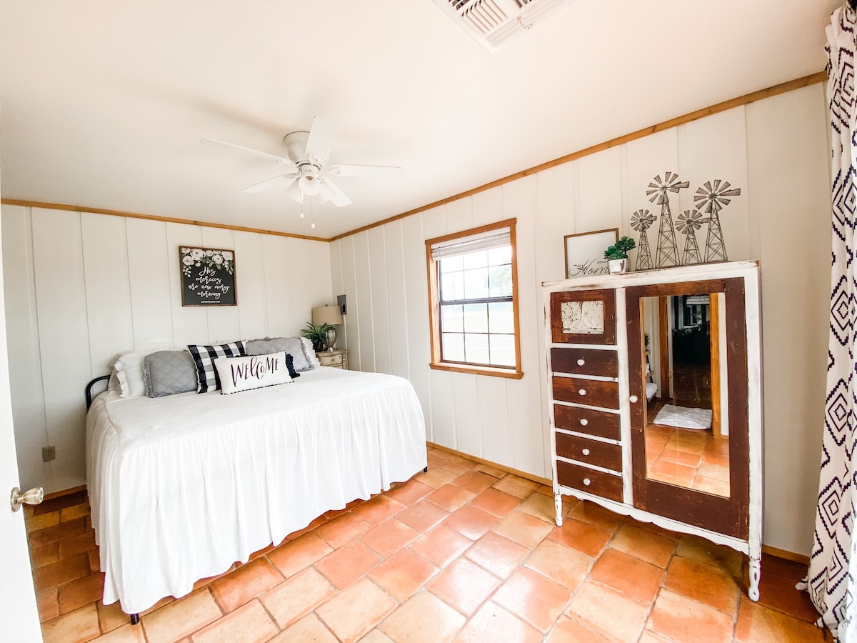 The main bedroom features a comfortable King size bed and armoire to store your belongings.