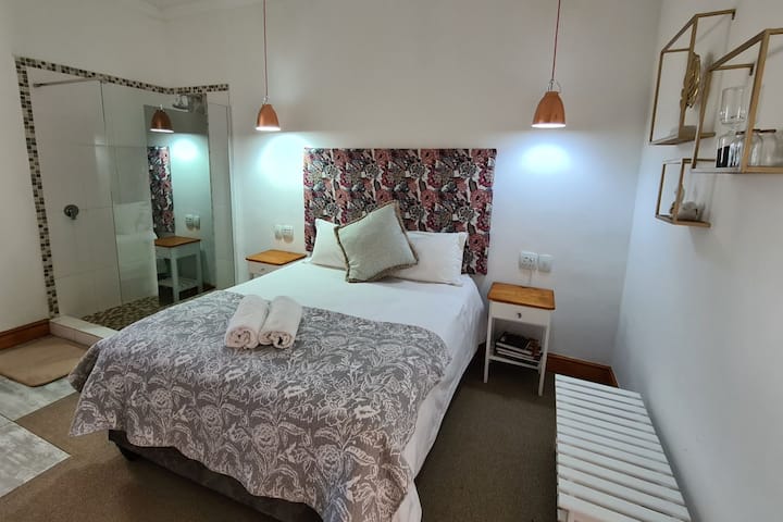 Three of the bedrooms are identical. Styled for your comfort.