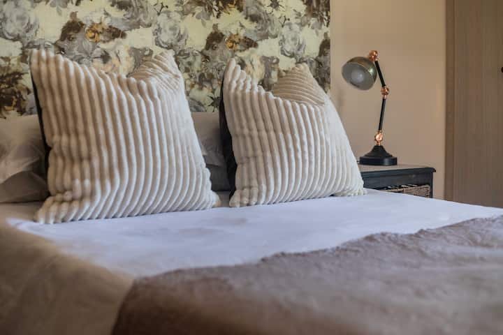 Bedroom 1 with en-suite bathroom