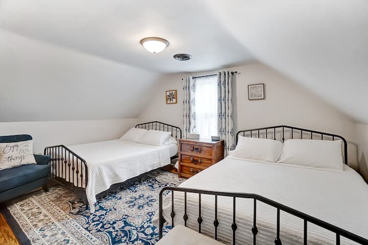 Upstairs Bedroom featuring 2 queen beds. Sleeps 4.